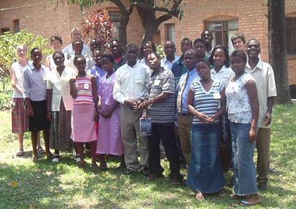 large group of people standing posing for a photograph